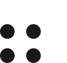 A black and white polka dot pattern on a dark background.