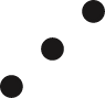 A monochrome polka dot pattern on a dark background.